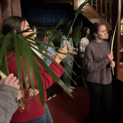 People holding palms for palm sunday